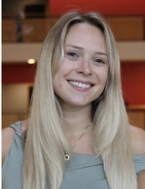 Photo of Camilla Lingjærde, smiling. She has long hair.