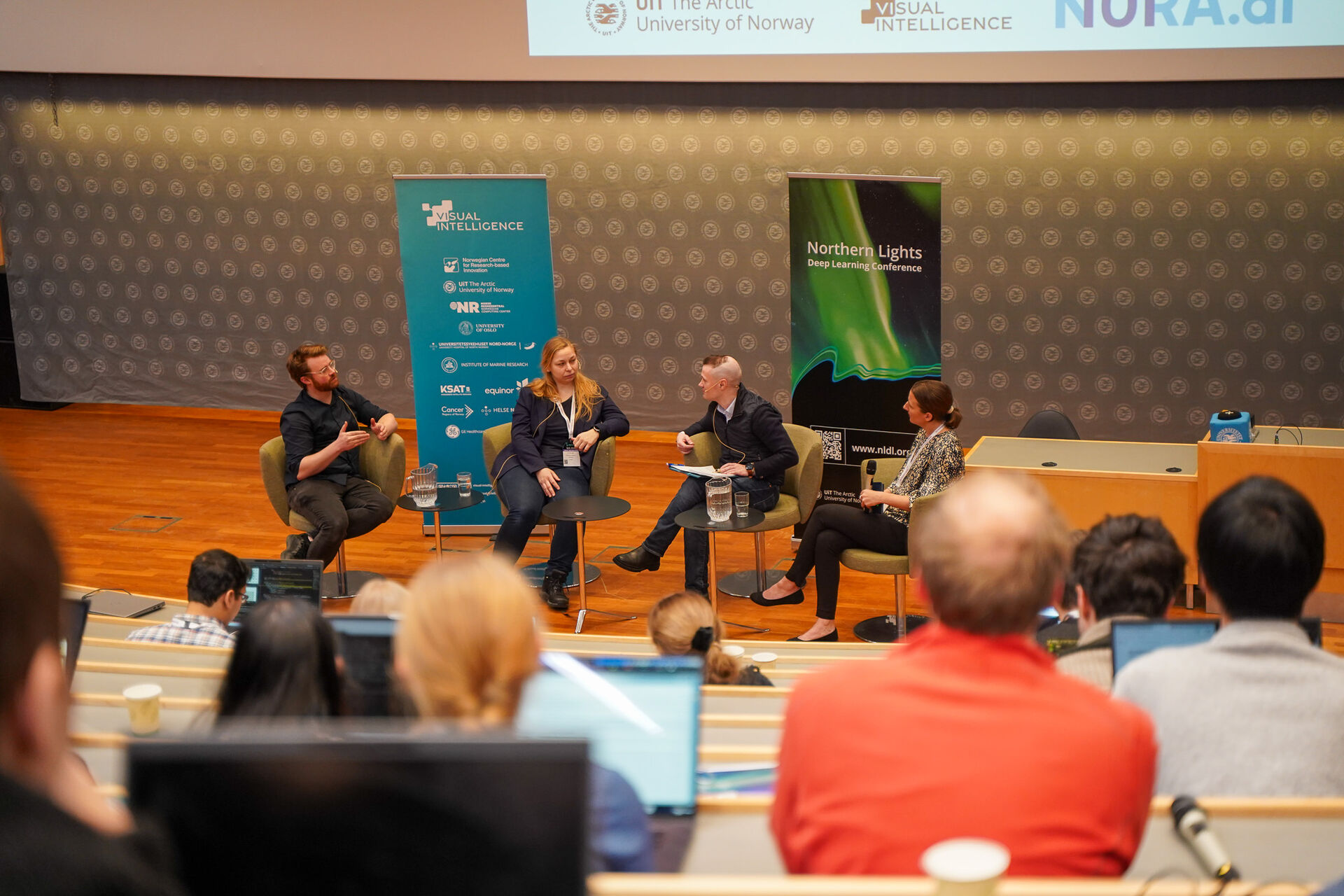 Panel with four people