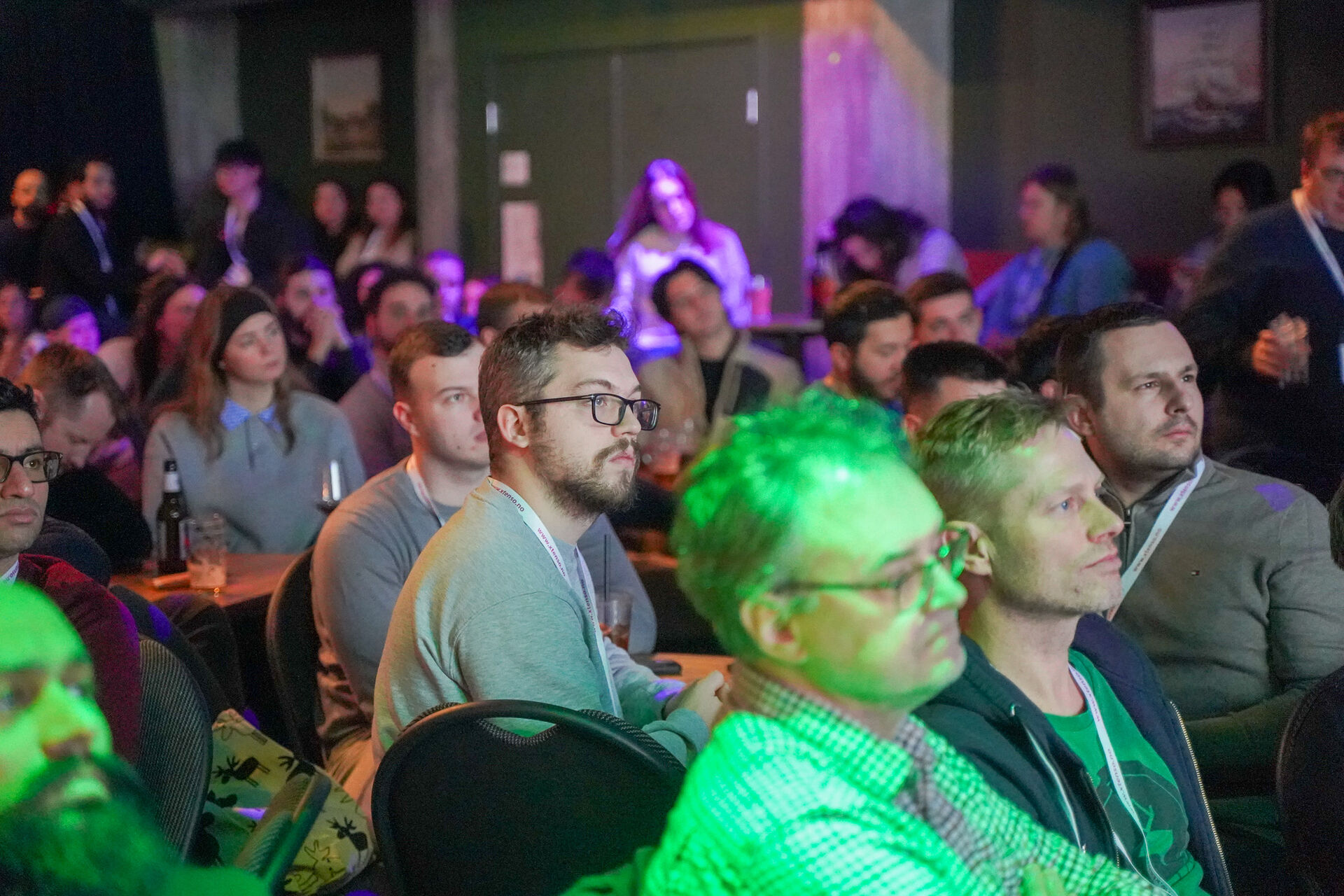 Audience of the event event in a green light