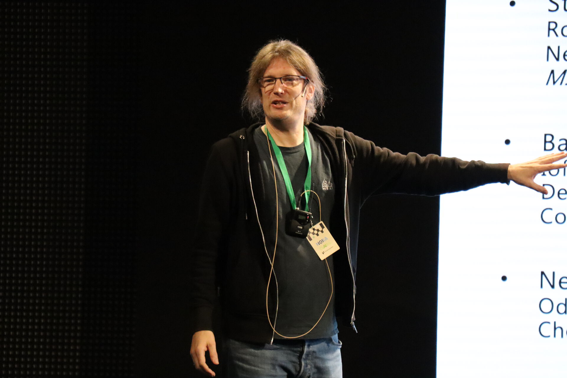 Christian Igel presenting his work at the Nordic AI Meet 2022