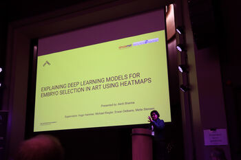 Podium ,Magenta ,Font ,Display device ,Event.