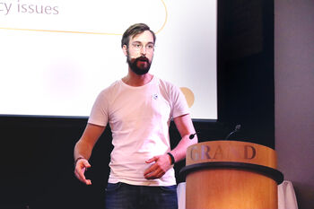 Human ,Podium ,Public address system ,Beard ,Idiophone.