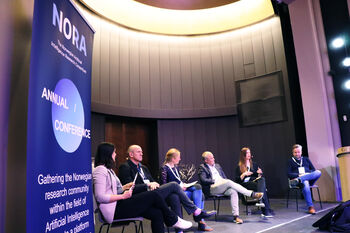 Blue ,Chair ,Suit ,Spokesperson ,Event.
