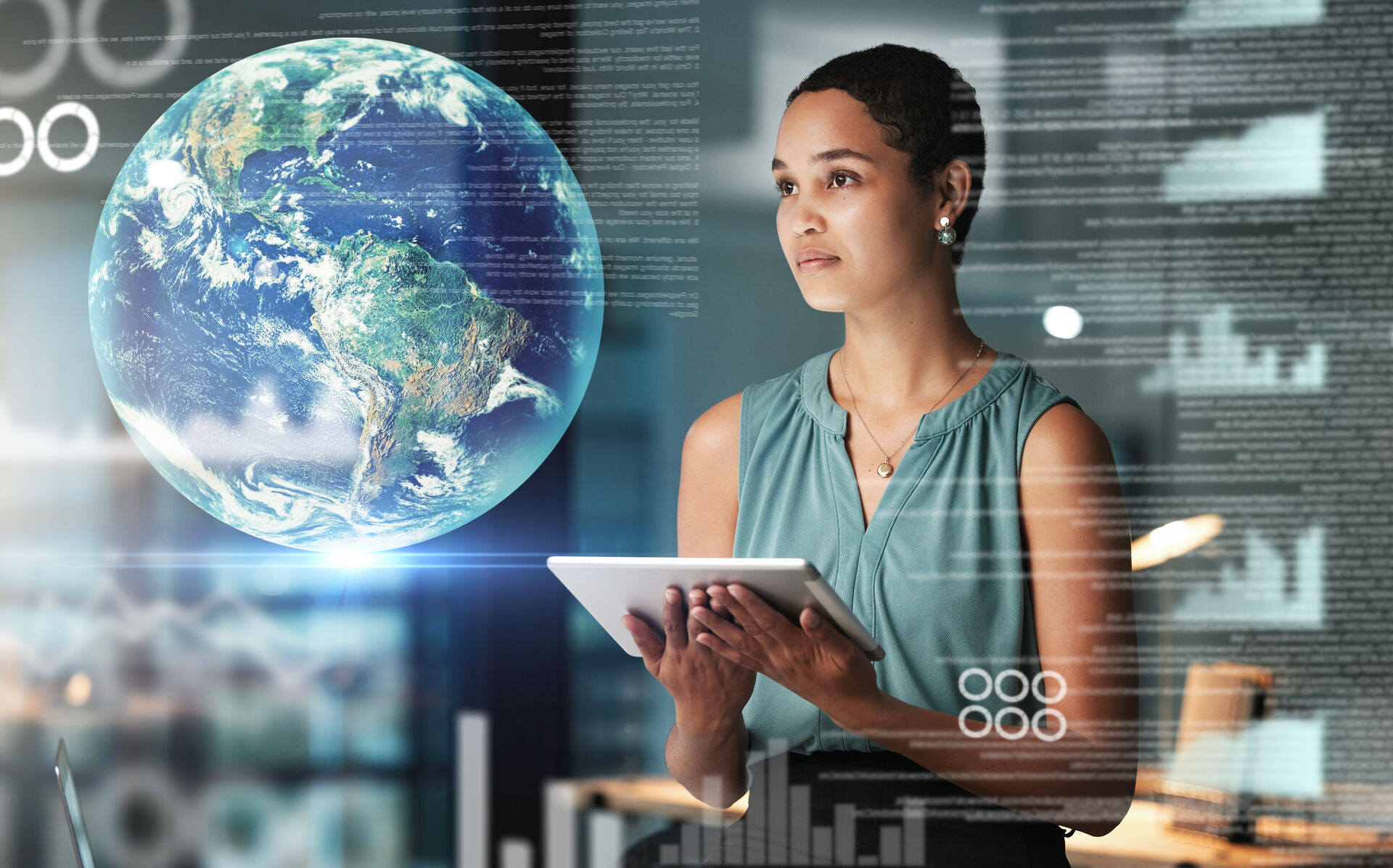 Woman looking the world on a screen, charts surrounding her